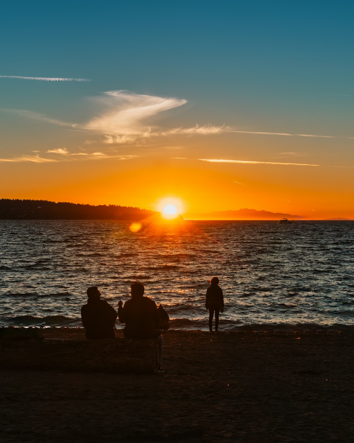 English Bay beach at sunset in Vancouver, BC